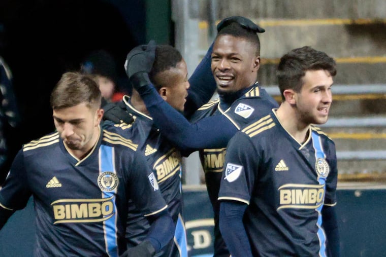 The Union's Sergio Santos (middle left) and Cory Burke (middle right) celebrate Burke’s first-half goal against the San Jose Earthquakes at Subaru Park on March 12.