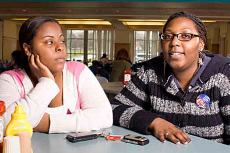 Lincoln students Shana Mitchell (left) and Lakeisha Fleet talk about how students felt about the required exercise course. (Ed Hille / Staff)