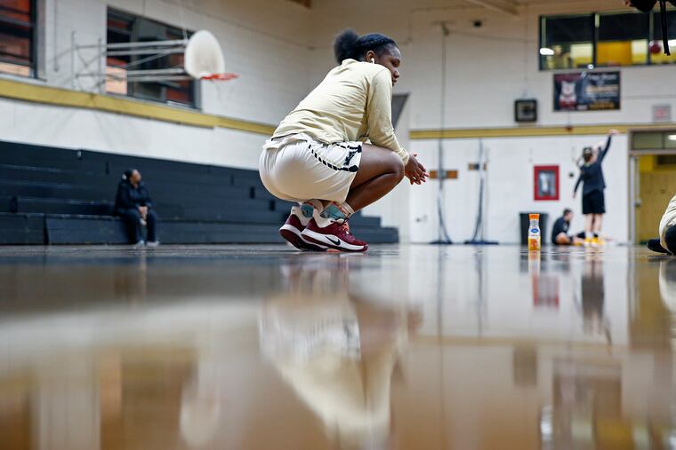 Neumann Goretti guard Diamond Johnson has a moment to herself before a Catholic League game against Archbishop Wood on Feb. 1, 2020.