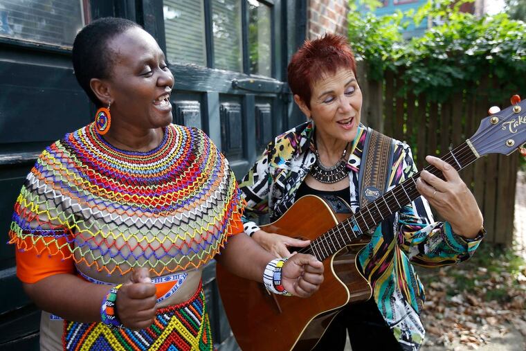 Musicians/educators Nonhlanhla Wanda (left) and Sharon Katz (right), along with Marilyn Cohen of Mount Airy, used music to spread peace in a racially divided South Africa 20 years ago. (Photo: MICHAEL BRYANT / Staff Photographer)