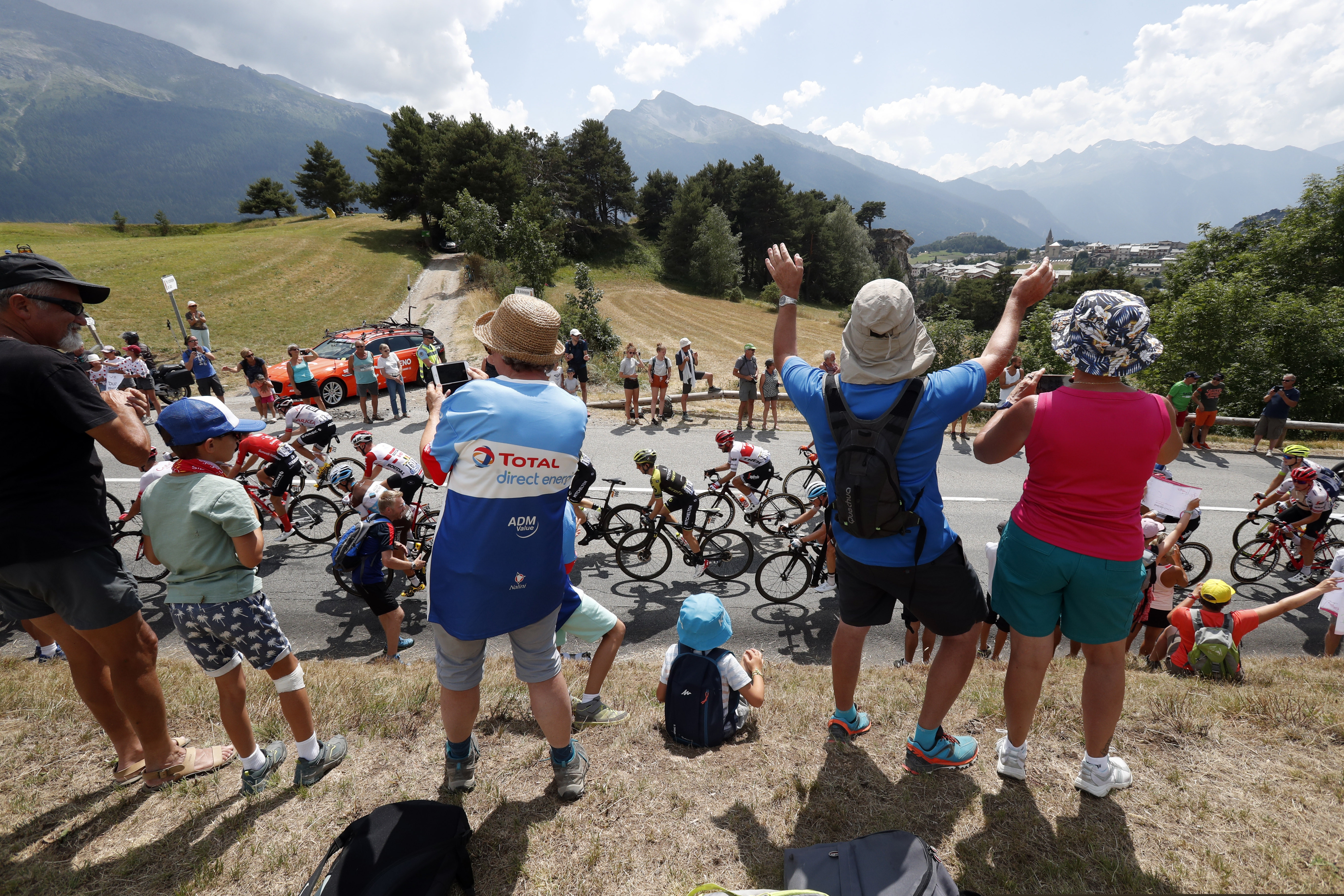 Spectators along the road applauding the riders during the 19th stage of last year's Tour de France.