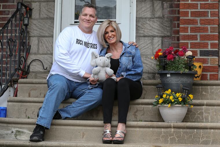 Kevin and Patti Bernard, foster parents of a 5-month old girl, at their home.
