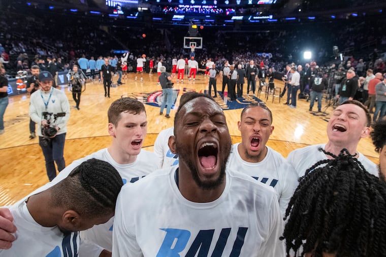 Dhamir Cosby-Roundtree, center, and the Villanova huddle before playing St. John's in the Big East Tournament.