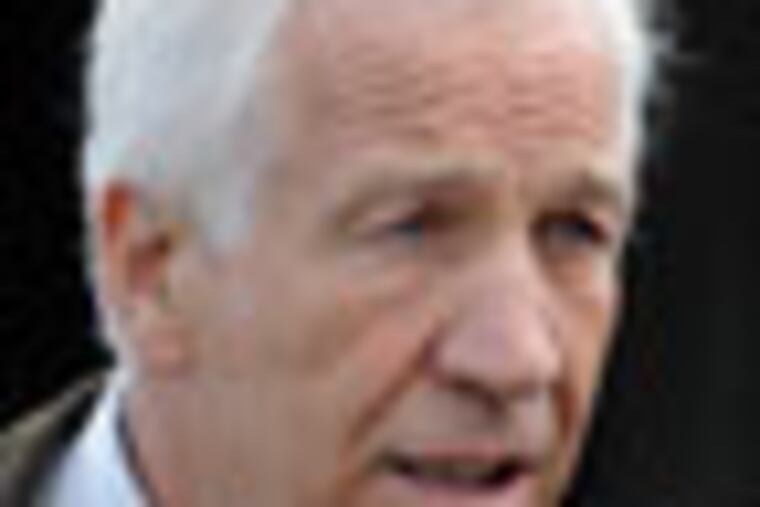 Jerry Sandusky leaves the Centre County Courthouse in Bellefonte, Pa. Thursday afternoon following the fourth day of his trial June 14, 2012. ( TOM GRALISH / Staff Photographer )