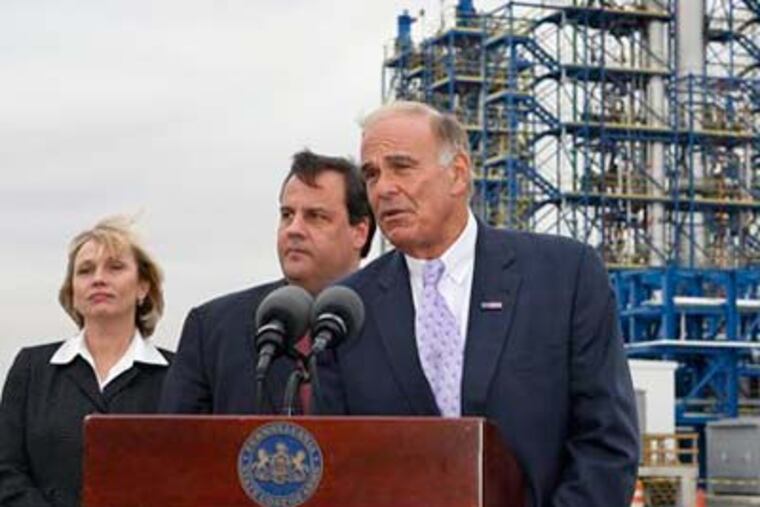 New Jersey Gov.-elect Chris Christie, center, and Lt. Gov.-elect Kim Guadagno, left, listen as Pennsylvania Gov. Ed Rendell, right, answers a question today in Fairless Hills, Pa. Among other things, Rendell met with Christie to talk about plans to deepen the Delaware River shipping channel. (AP Photo/Mel Evans)