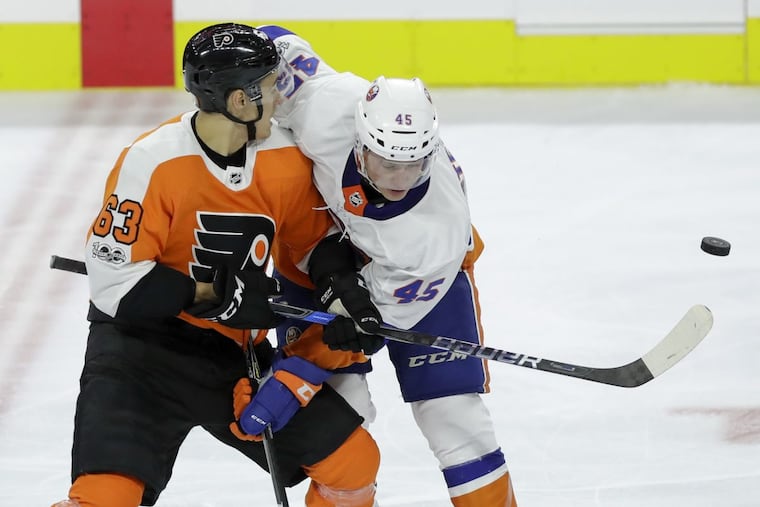 The Islanders’ John Stevens Jr. (right), son of the former Flyers coach, calls Sea Isle home.