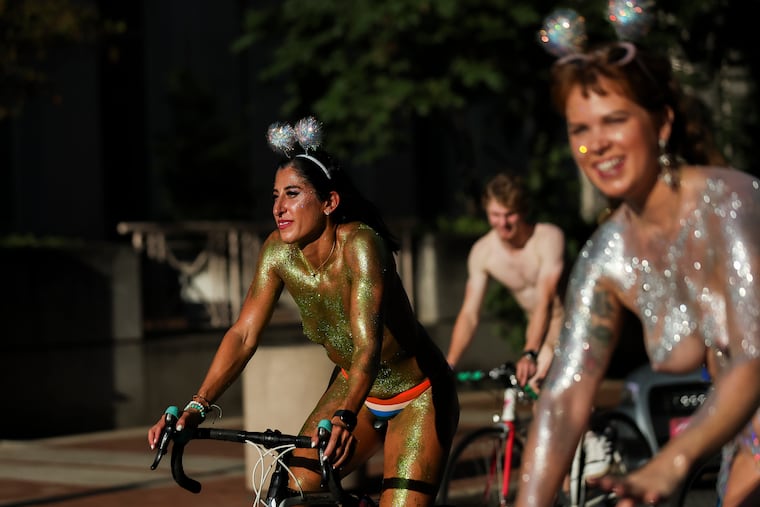 The Philly Naked Bike Ride makes its down Arch St. before turning down 13th St.