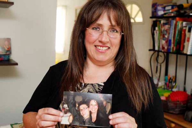Lisa MacMullin shows her favorite picture of David and her, taken on Oct.15, 2011.
( AKIRA SUWA / Staff Photographer )
A portrait of Lisa MacMullin in her home. She and her husband, Brian, have struggled with her son, David's drug addiction for five years.