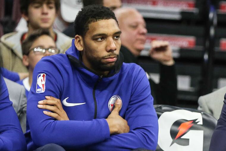 The Sixers' Jahlil Okafor sits on the bench watching his team play the Hawks at the Wells Fargo Center on Wednesday, November 1, 2017.