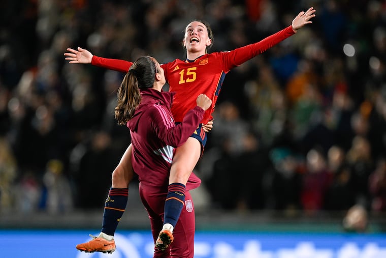 Eva Navarro gets a lift from a teammate after Spain defeated Sweden in their women's World Cup semifinal in Auckland, New Zealand.