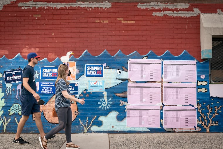 Voter Alix Zaremby, second from left, at the Fishtown recreation center in Philadelphia, where there was a polling place Tuesday.