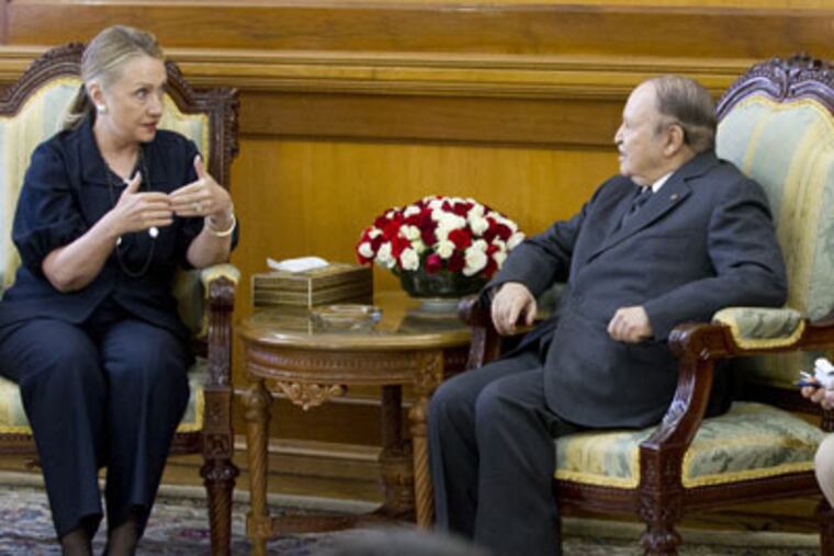 Algerian President Abdelaziz Bouteflika, second right, speaks with US Secretary of State Hillary Rodham Clinton, at the Mouradia Palace, in Algiers, Algeria, Monday, Oct. 29, 2012. U.S. Secretary of State Hillary Rodham Clinton sought Algeria's assistance on Monday for any future military intervention in Mali, pressing the North African nation to provide intelligence, if not boots on the ground to help rout the al-Qaida-linked militants across its southern border. Clinton, on the first stop of a five-day trip overseas, met with Algerian President Abdelaziz Bouteflika as the United States and its allies ramped up preparations to fight northern Mali's breakaway Islamist republic. (AP Photo, Saul Loeb, Pool)