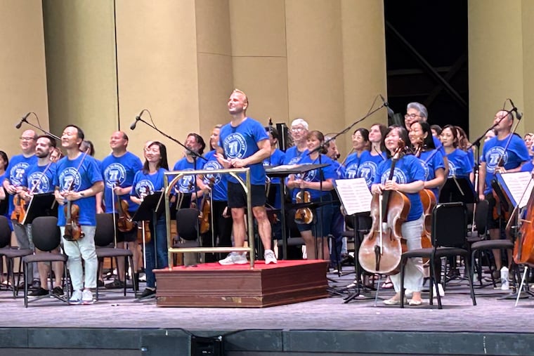 Philadelphia Orchestra music and artistic director Yannick Nézet-Séguin wore blue musicians union T-shirt in solidarity with his orchestra members in August during an open rehearsal in Saratoga Springs, N.Y. The musicians, represented by Local 77 of the American Federation of Musicians, have ratified a new contract with the Philadelphia Orchestra and Kimmel Center.