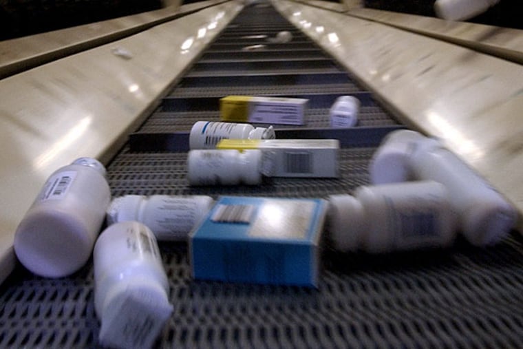 Drugs go through a sorting process at AmerisourceBergen before shipping. (File photo: Michael Perez / Staff Photographer)