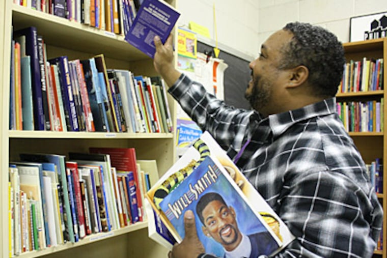 Clyde Russell doesn’t have to go far to visit the book bank. Russell is a student adviser at Martin Luther King High School, where the book bank uses space for its operation. (Ashley Nguyen /Staff)