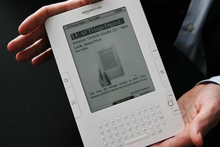 Amazon.com's new Kindle e-reader improves on the original in some aspects, but the price hasn't changed. (Mark Lennihan/AP)