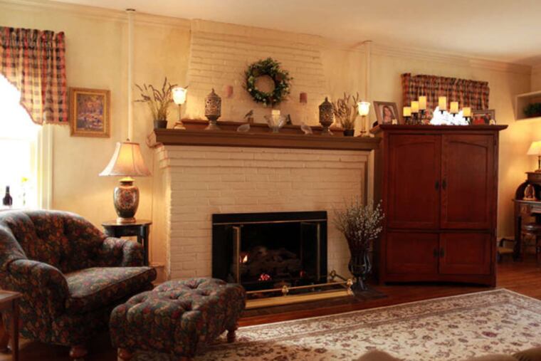 Over the years, the Clarks have made changes to the house, including removing the downstairs wall-to-wall carpeting, revealing the original wooden floors and giving a new look to the living room.