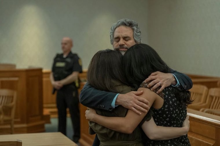 Tom Brandis (Mark Ruffalo) hugs his family after his son Ethan's parole hearing in the "Task" finale.