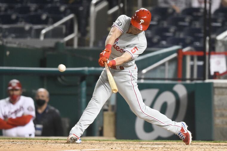 Andrew Knapp (5) of the Philadelphia Phillies singles in two runs in the eighth inning against the Washington Nationals at Nationals Park on May 11, 2021 in Washington, DC. (Mitchell Layton/Getty Images/TNS)