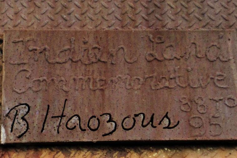 A close-up of the inscription at the baseof Haozous' sculpture.