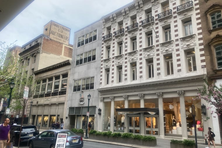The three buildings (from the left) would be part of the new residential tower planned by Astoban Investments. On the right is historic clothier Boyd's.