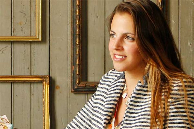 Courtney Apple, who co-owns Hand in Hand Soap with her husband. Apple is the branding manager and chief visionary for the company, which was started in 2011. The couple are social entrepreneurs and the business model is based on sustainable giving. For every bar of soap that is purchased, Hand in Hand donates a bar to help save a life. (David Maialetti / Staff Photographer)