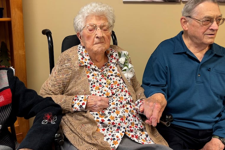 Bessie Laurena Hendricks, center, celebrating her 115th birthday in November, was believed to be the oldest living person in the U.S.