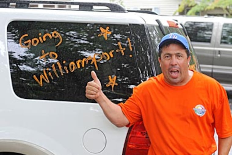Bill Lumi, father of rightfielder Billy Lumi, gives a thumbs-up. Said the boy's mother, Melissa: "As soon as we play our first game on Saturday, we'll all be a nervous mess again." (Clem Murray/Staff)