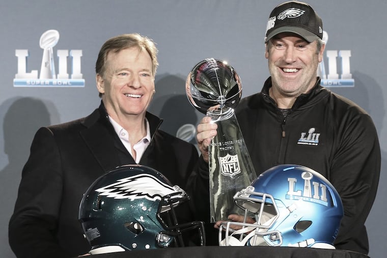 Eagles head coach Doug Pederson poses with the Lombardi Trophy and NFL Commissioner Roger Goodell the morning after winning Super Bowl LII in Minneapolis.