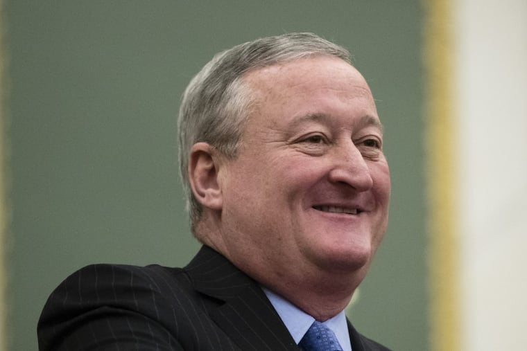 Mayor Kenney smiles before speaking on the School Reform Commission at City Hall on Thursday.