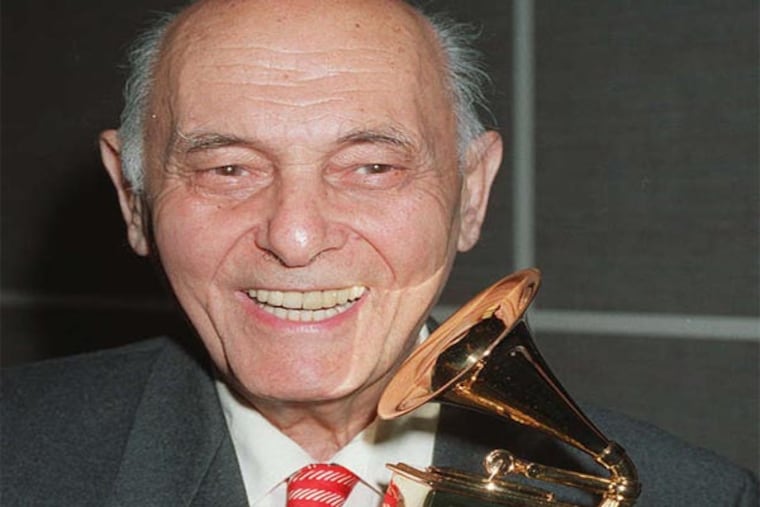 Sir Georg Solti with his 30th Grammy Award in 1992. He won 32 in all, and worried that Michael Jackson would best him. MALCOLM CLARKE / AP