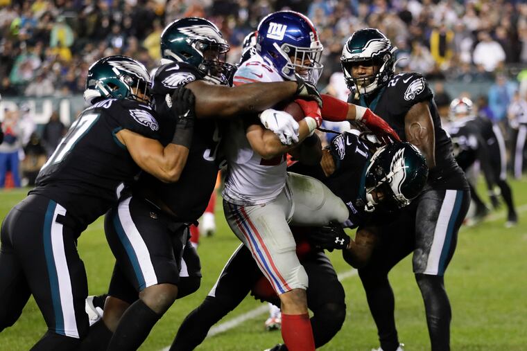 It takes a village to stop New York's Saquon Barkley.