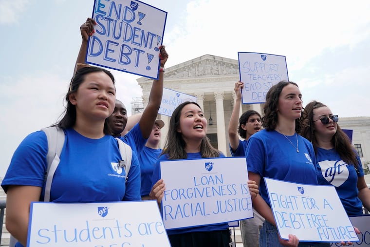 People demonstrate outside the U.S. Supreme Court in June. A sharply divided court has ruled that the Biden administration overstepped its authority in trying to cancel or reduce student loan debts for millions of Americans.