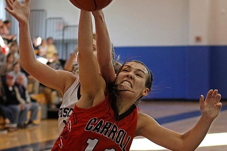 Archbishop Carroll's Julia Gantz wins a rebound from Episcopal Academy's Lily Kuntz. (Michael Bryant/Staff Photographer)