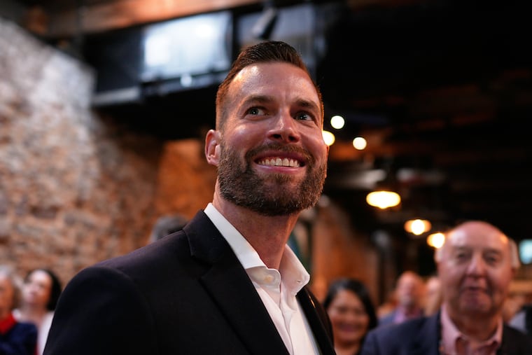Republican candidate Clay Fuller smiles as election results roll in during an election night watch party, Tuesday, April 7, 2026, in Ringgold, Ga.