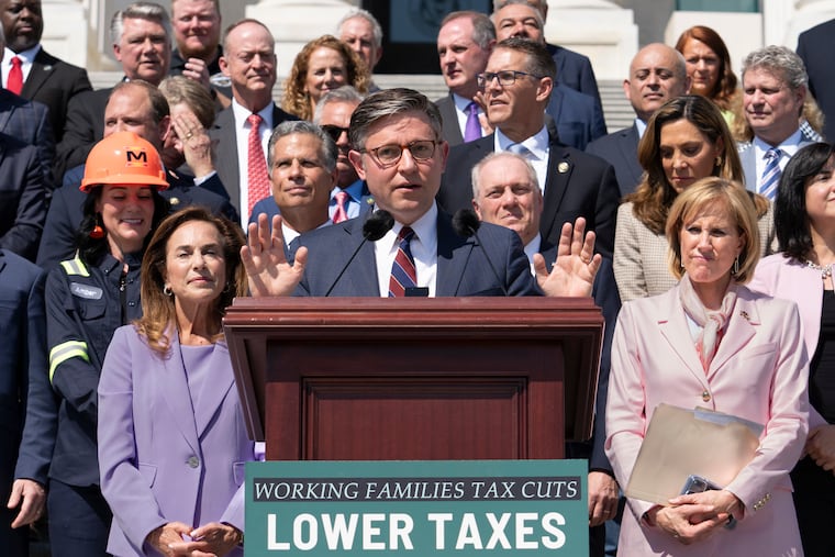 Speaker of the House Mike Johnson, R-La., and fellow Republicans celebrate GOP tax policies at an event outside the Capitol in Washington, Wednesday, April 15, 2026.