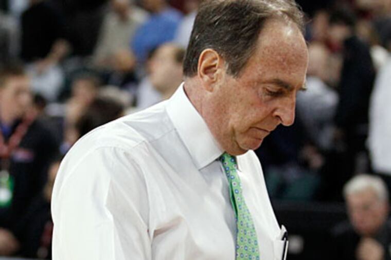Temple coach Fran Dunphy walks off the court following the Owls' A-10 tournament loss to UMass. (Yong Kim/Staff Photographer)