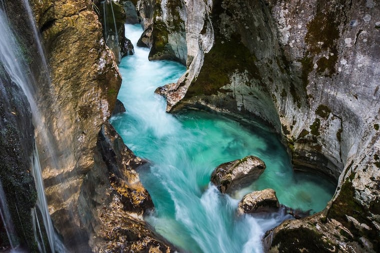 About the Soča River, Ernest Hemingway wrote in "A Farewell to Arms": "The river was low and there were stretches of sand and pebbles with a narrow channel of water and sometimes the water spread like a sheen over the pebbly bed. Close to the bank I saw deep pools, the water blue like the sky … "