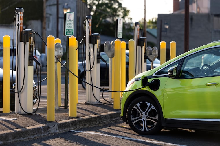 A Chevrolet Bolt at a ChargePoint electric vehicle charging station in Hudson, N.Y.