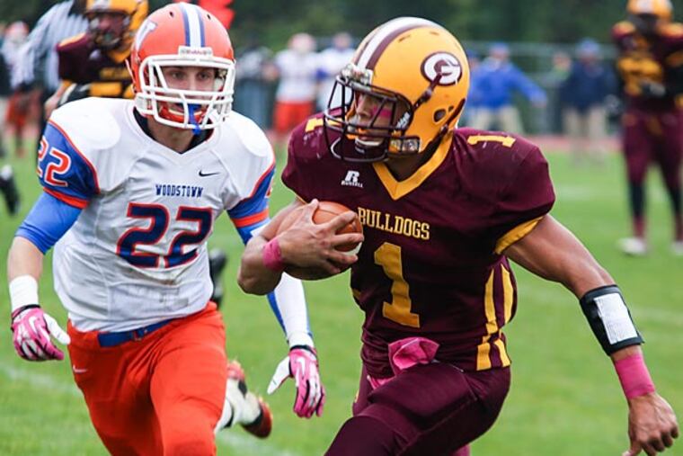 Glassboro's Ronnie James rushes the ball during the third quarter. (Andrew Thayer/Staff Photographer)