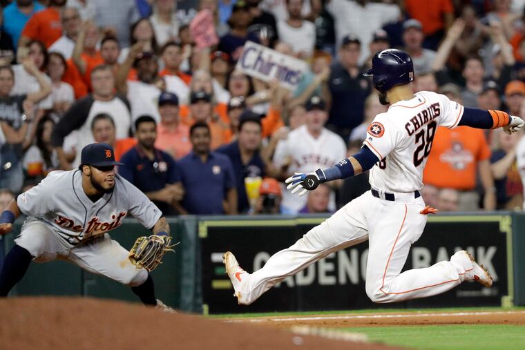 Houston's Robinson Chirinos is tagged out by at third base by Dawel Lugo for the final out of the game Wednesday night.