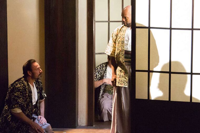 Joe Guzman as Cassius and Forrest McClendon as Julius Caesar in Lantern Theater Company's production of William Shakespeare's Julius Caesar. (Mark Garvin photo)