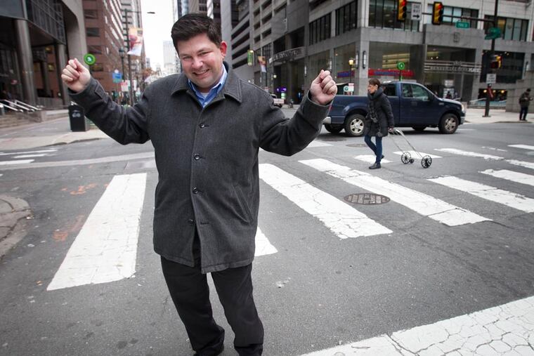 Joe Biondo (a/k/a Mr. Mummer) along Market Street near 19th on Friday, Dec. 5. ( ALEJANDRO A. ALVAREZ / STAFF PHOTOGRAPHER )