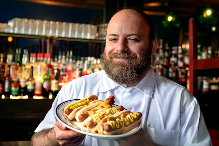 Chef Nic Macri uses his butchery background for his hot dog specials at Royal Tavern.