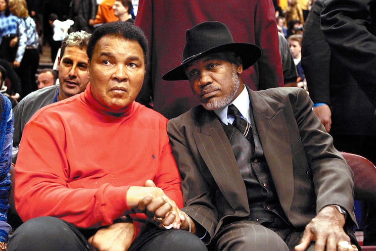 Former boxing champions Muhammad Ali and Joe Frazier in a rare moment, at the NBA All-Star Game in Philadelphia. Thursday, Jun 10, 2004 Philadelphia Daily News/George Reynolds