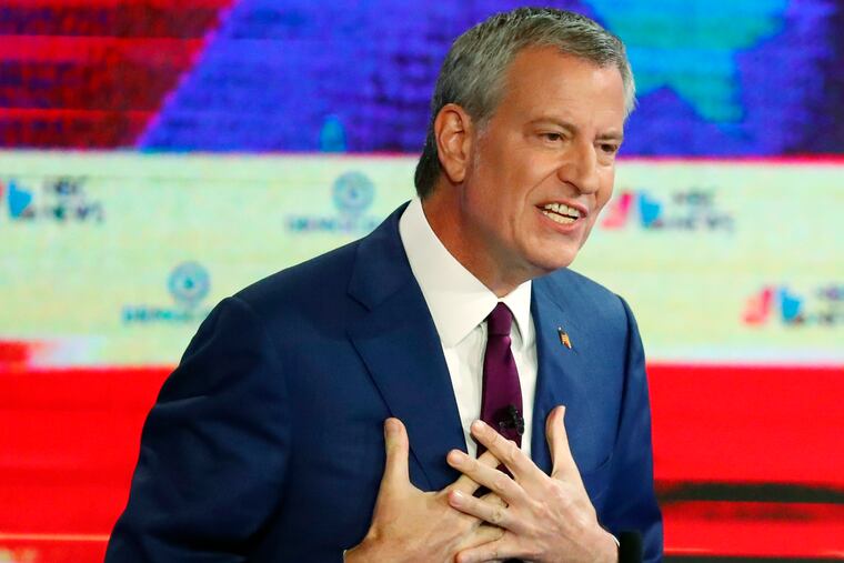 Democratic presidential candidate New York City Mayor Bill de Blasio gestures during a Democratic primary debate hosted by NBC News at the Adrienne Arsht Center for the Performing Art, Wednesday, June 26, 2019, in Miami.