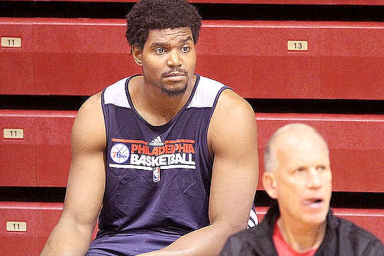 Sixers center Andrew Bynum spoke to the media after today's practice, and while he said it will still be a week or two before he returns to practice. (Charles Fox/Staff file photo)
