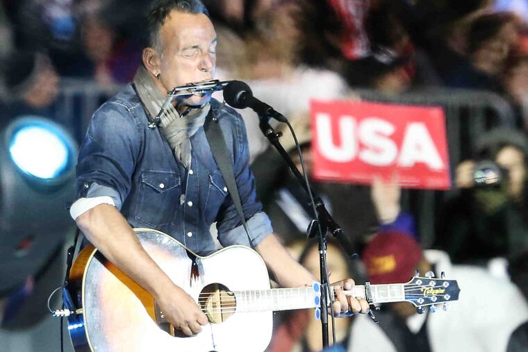 Bruce Springsteen plays for supporters at the rally for Hillary Clinton in Philadelphia, Monday, November 7, 2016.