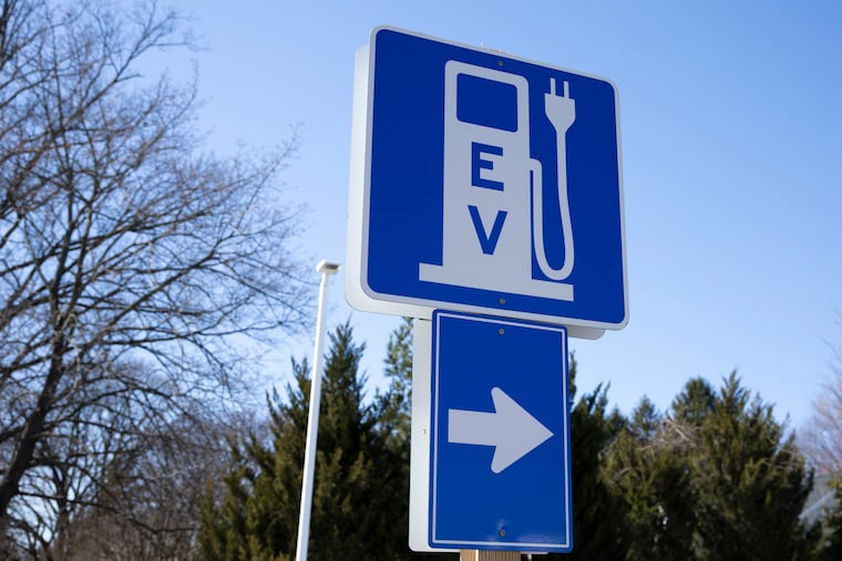 Signage points to the EV charging station at the Royal Farms in Upper Chichester, Delaware County.