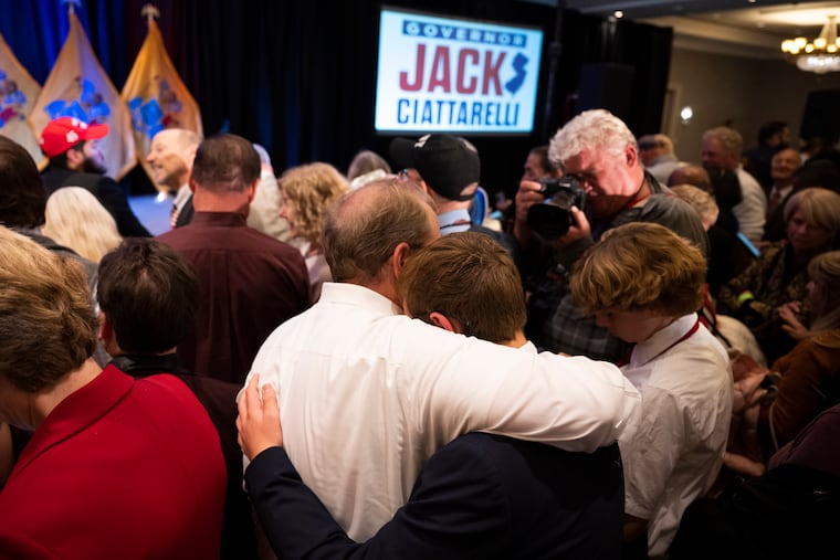 Supporters of Jack Ciattarelli console each other Tuesday as the New Jersey Republican gubernatorial candidate delivers a concession speech at his election night headquarters in Bridgewater, N.J.
